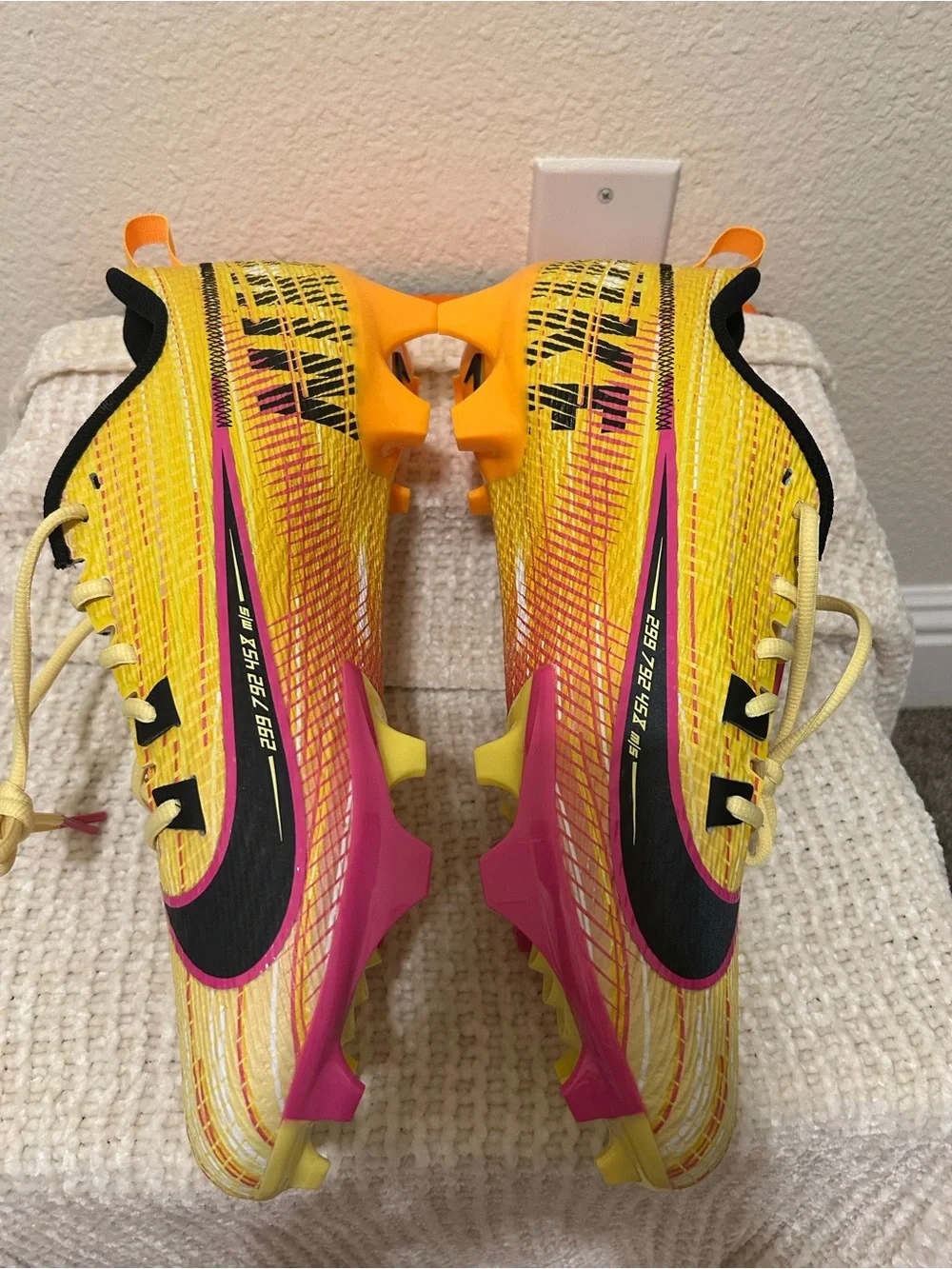 Nike Yellow and Black Athletic Sneakers with Pink Swoosh